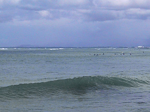 Surfen an der Küste Foto 